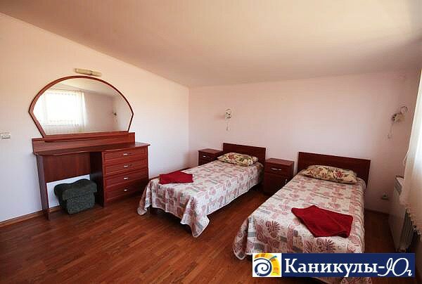 Спальня в апартаментах отеля 'Лиана' в Евпатории